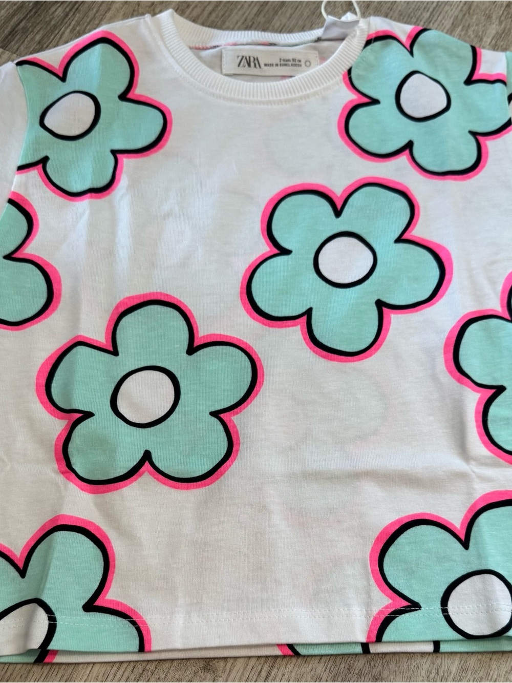 ZARA White Tee with blue Flower Print and Neon Pink Outline
